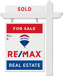 A sign that says sold for sale and re / max.